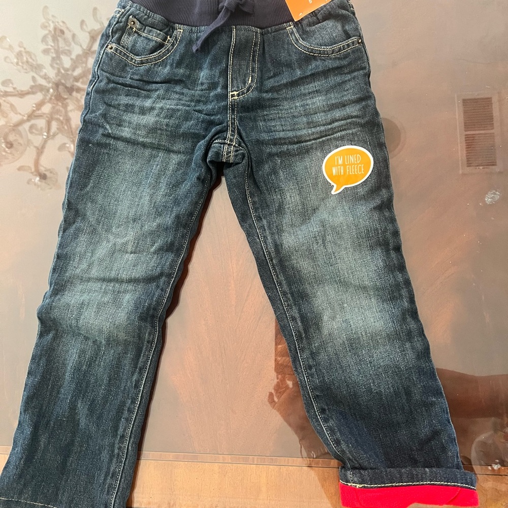 Brand New cargo blue jeans size 5 with red fleece lining